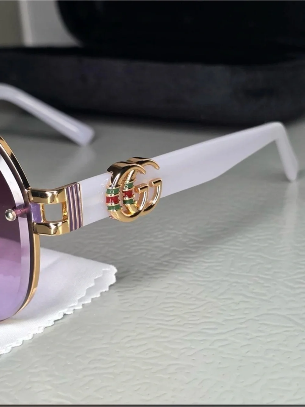 Gucci Gold Frame Sunglasses with Purple Gradient Lenses